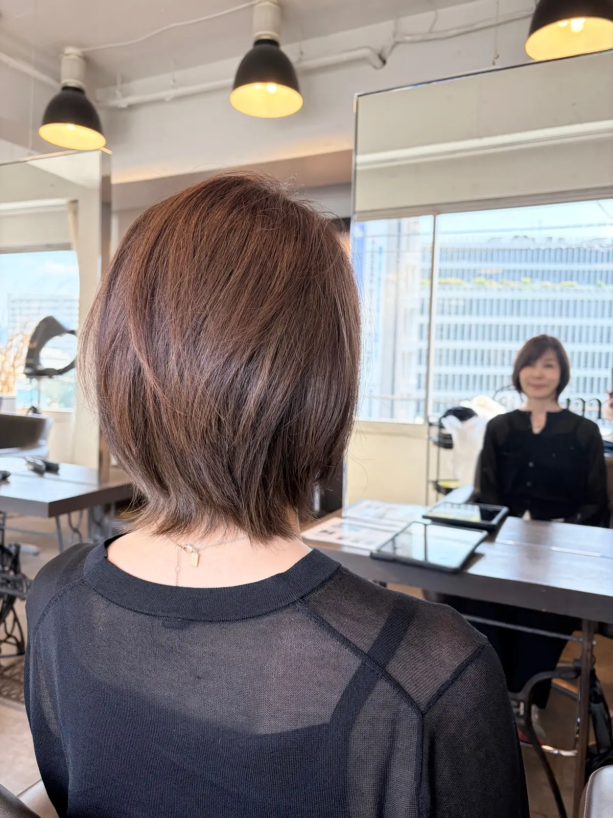 50代髪型　　ショートボブ　レイヤーボブ　50代髪型　50代にちょうど良い、ショートとボブの間。外ハネボブがかわいい。