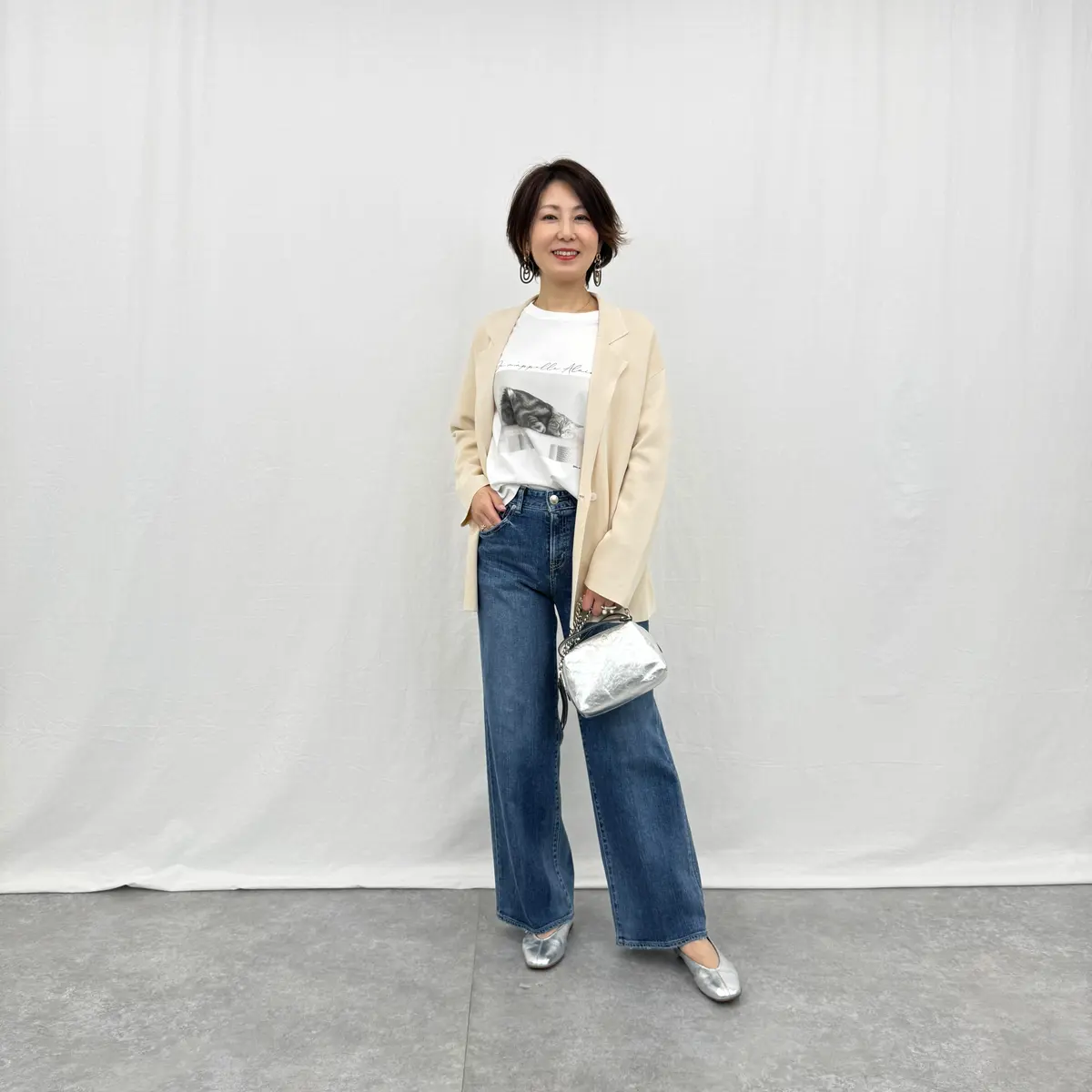 three dots×eclat ニットジャケット ￥27,500を着た華組・小林五月子さん