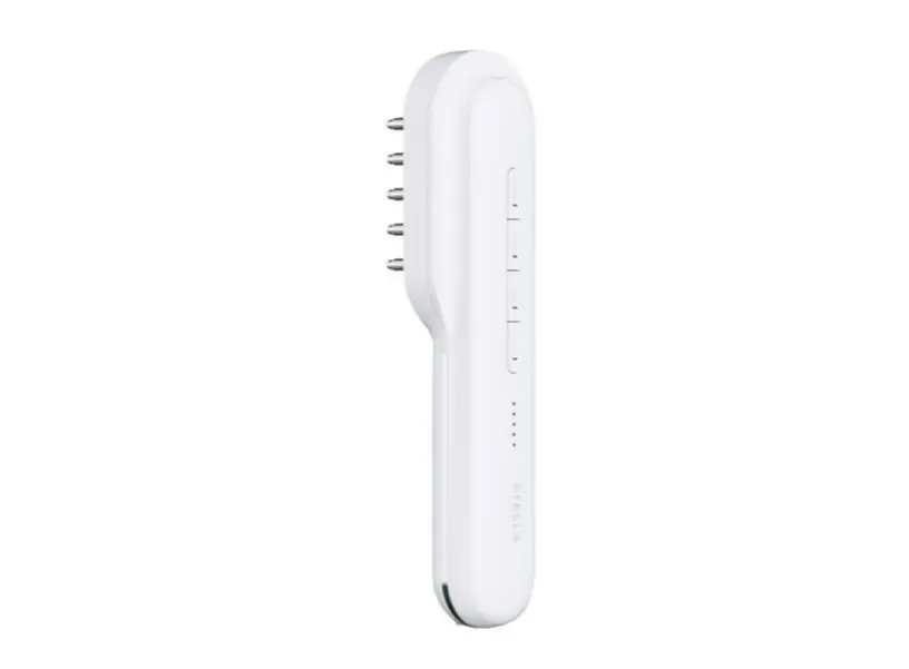 白を基調とした、スティック状のヘアケア機器。先端にLEDライトが並び、本体上部には操作ボタンがある。製品名は「STELLA」。