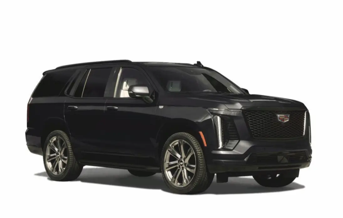 CADILLAC / ESCALADE 黒色のキャデラック エスカレード SUV。大型で四輪駆動、フロントグリルにブランドロゴが配置されている。ホイールはシルバーで、全体的に高級感のあるデザイン。