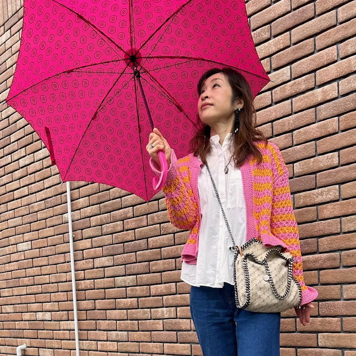 雨の日のピンクコーデの画像_2