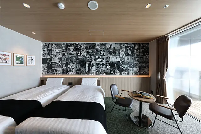 球場内の「tower eleven hotel」。スポーツをコンセ プトにした客室からスタジ アムが眺められる