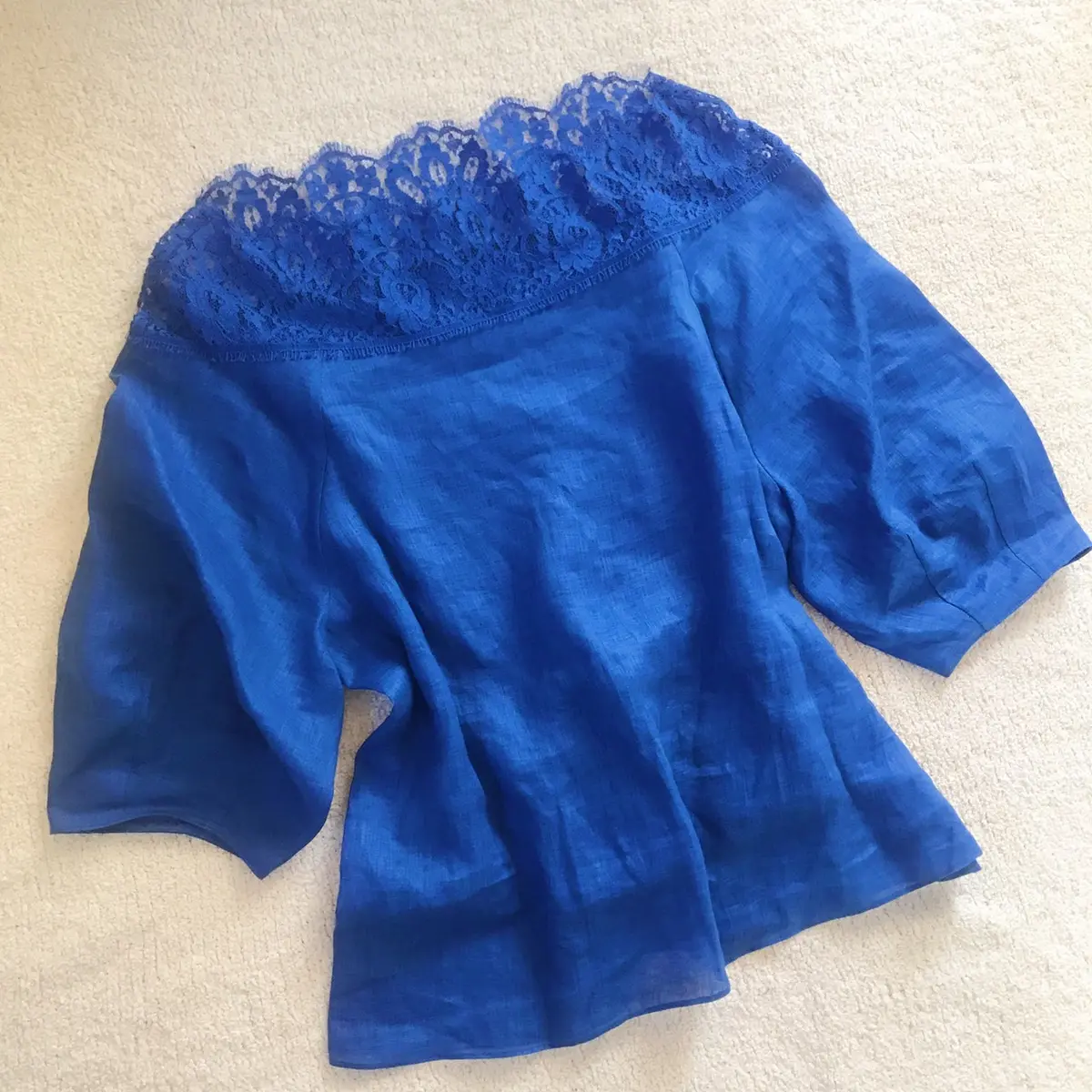 ブルーのリネントップスの画像_1