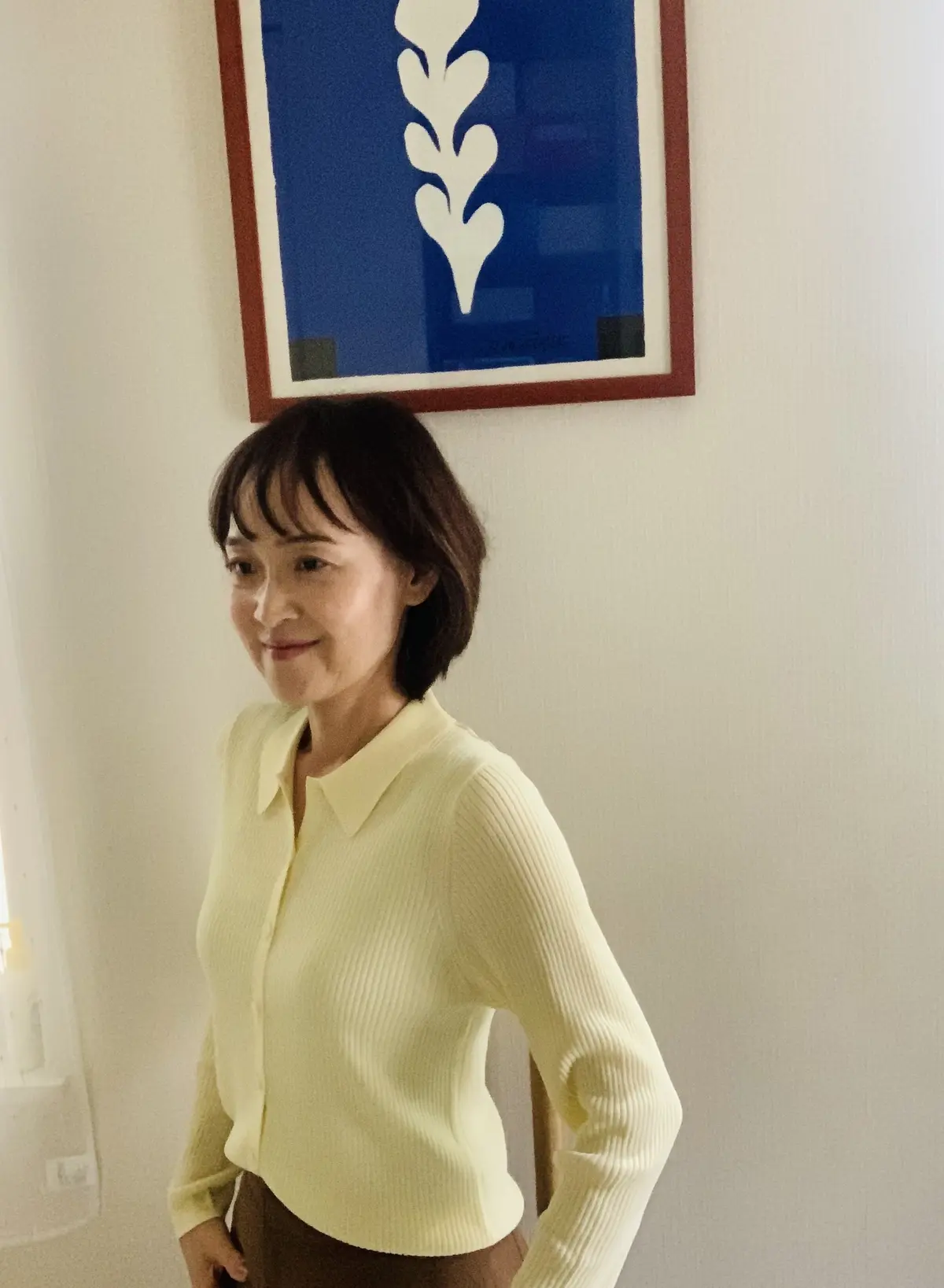 優しい色味の黄色のユニクロリブポロカーディガン