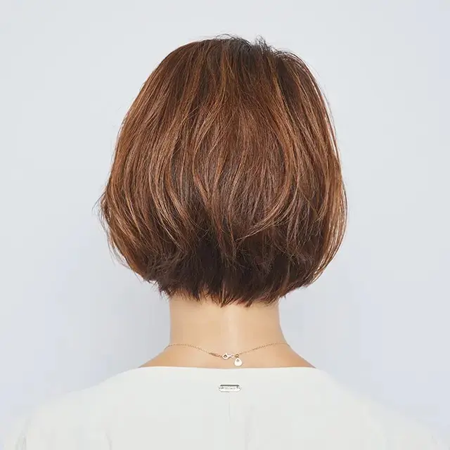 50代らしい華やかさと甘さが欲しいなら、ゆるめパーマで“ベル型”ボブに【50代髪型・ヘアスタイル】