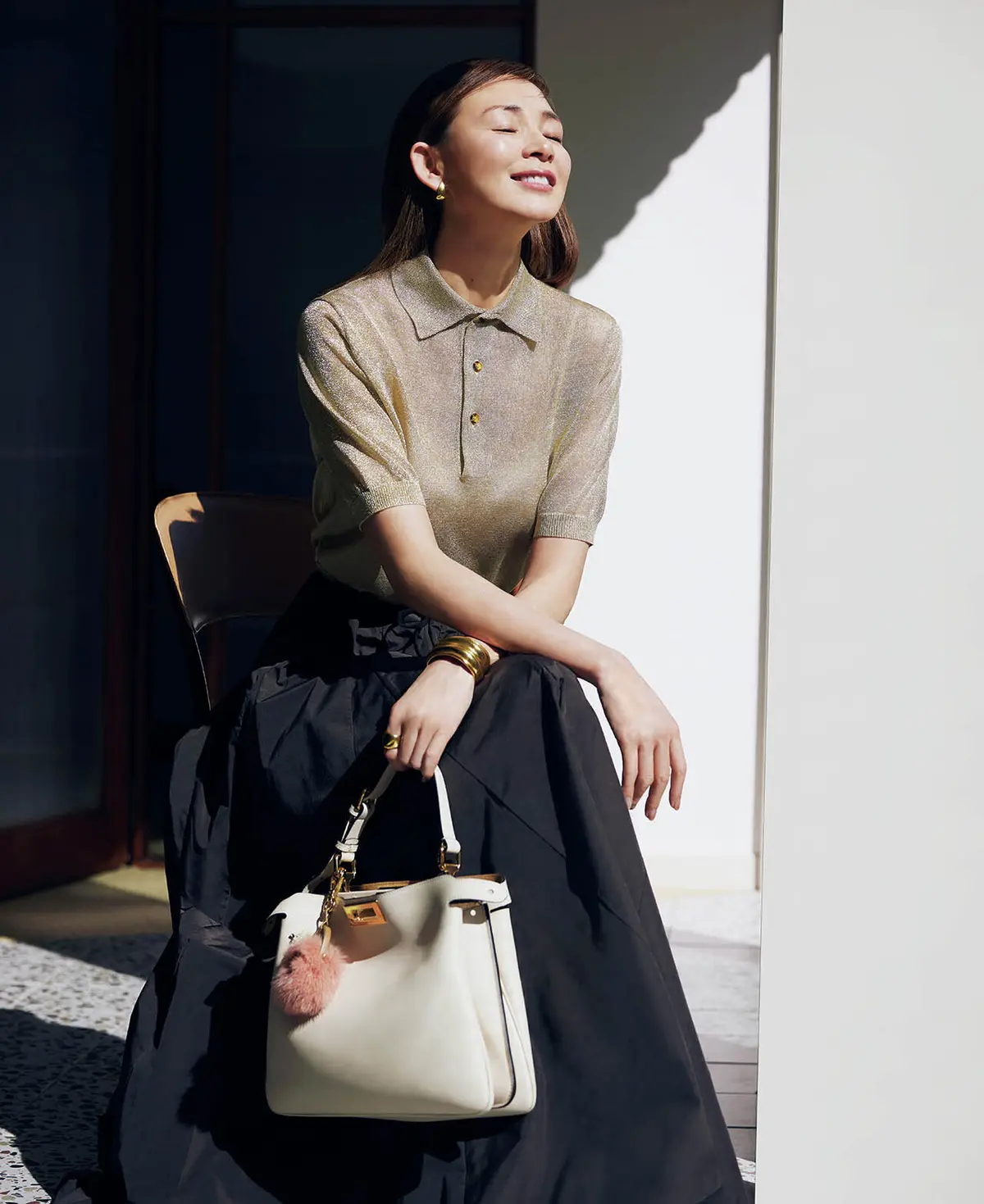 ポロニットのカジュアルさと 繊細なラメ感でエフォートレスに