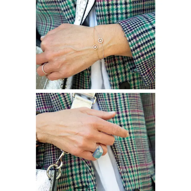 左手にはSarlaneのブレスレット。ダイヤをあしらったモチーフは、軽快でこれからの季節にぴったり。