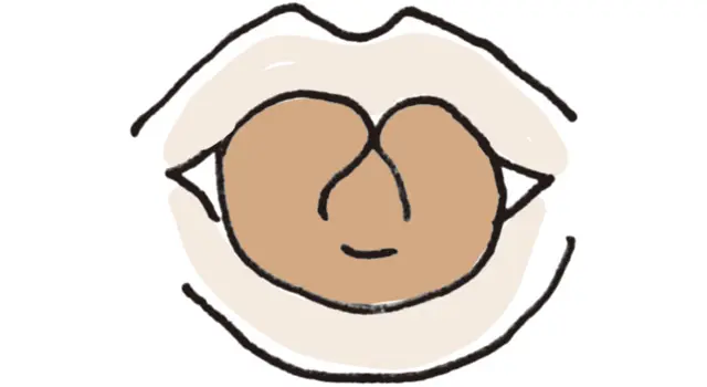 舌を縦に丸め、両端をくっつける。