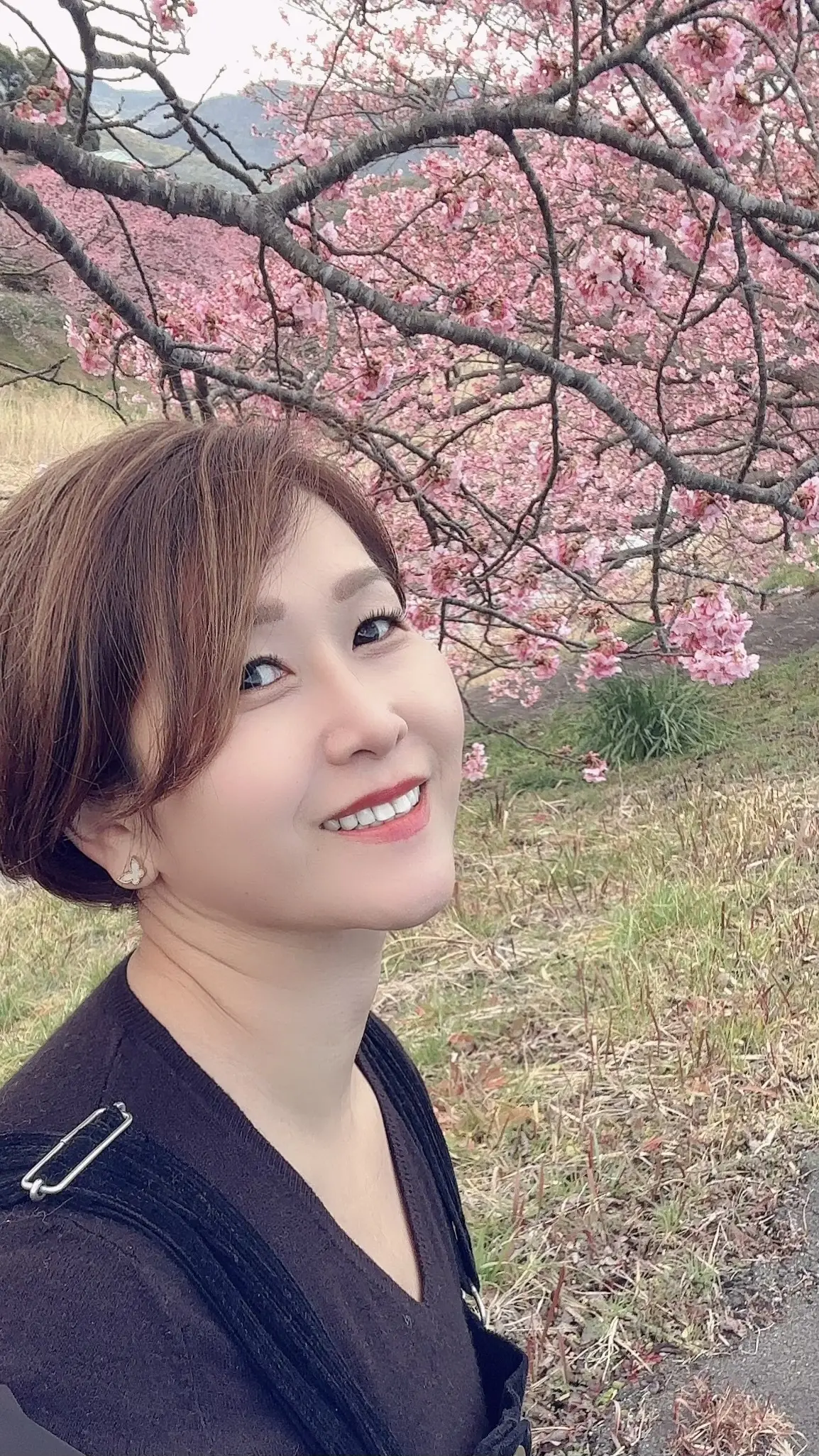 湯煙漂う河津桜並木を散策の画像_1