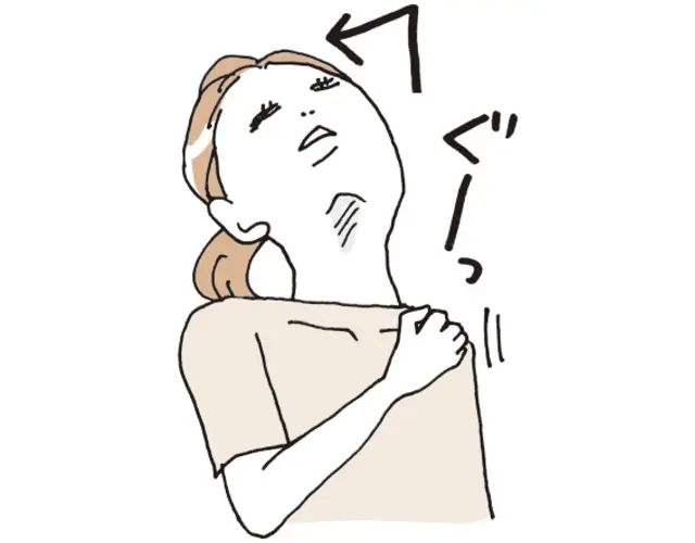 右手を左肩に置き、わきを締める