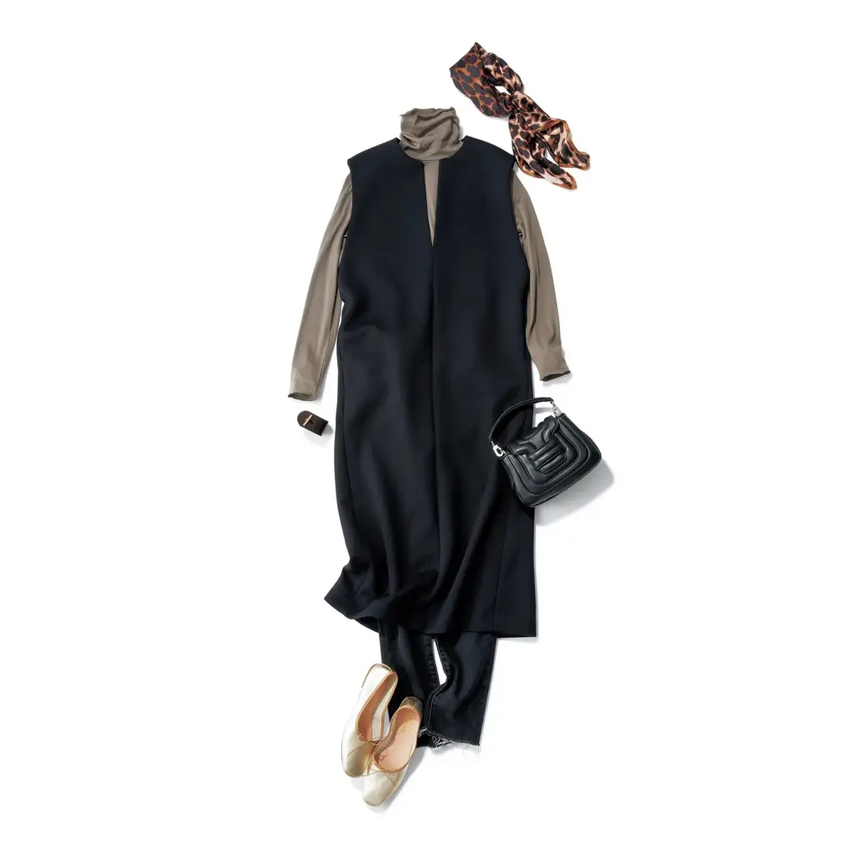 ジャンパースカート×パンツのレイヤードでつくる縦長シルエットで旬なバランスに。最低気温5℃