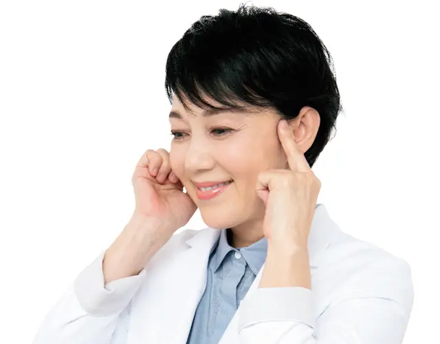 耳の上部手前にある、小さなくぼみを探してプッシュ