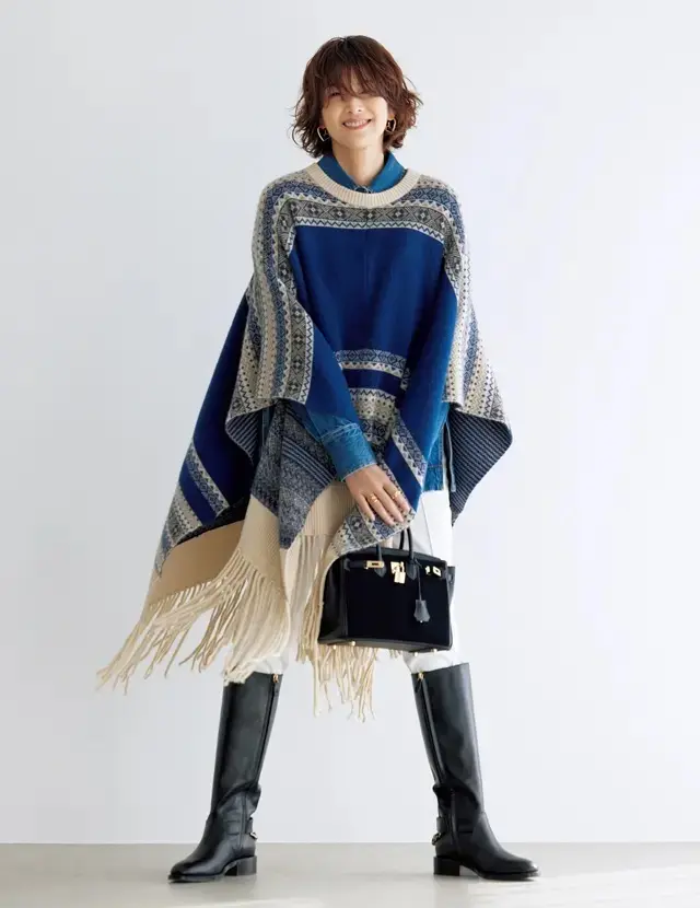 「トレンドに関係なく、冬はロングブーツ派。低めヒールにパンツをインして私らしく！」