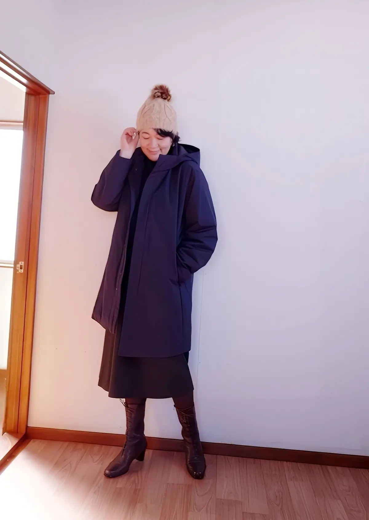 ユニクロハイブリッドダウンコート正面の私