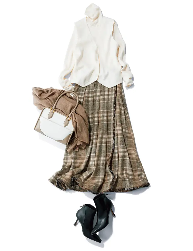 スカートスタイルに辛さをプラス。 ベストのもつ印象変え効果を体感