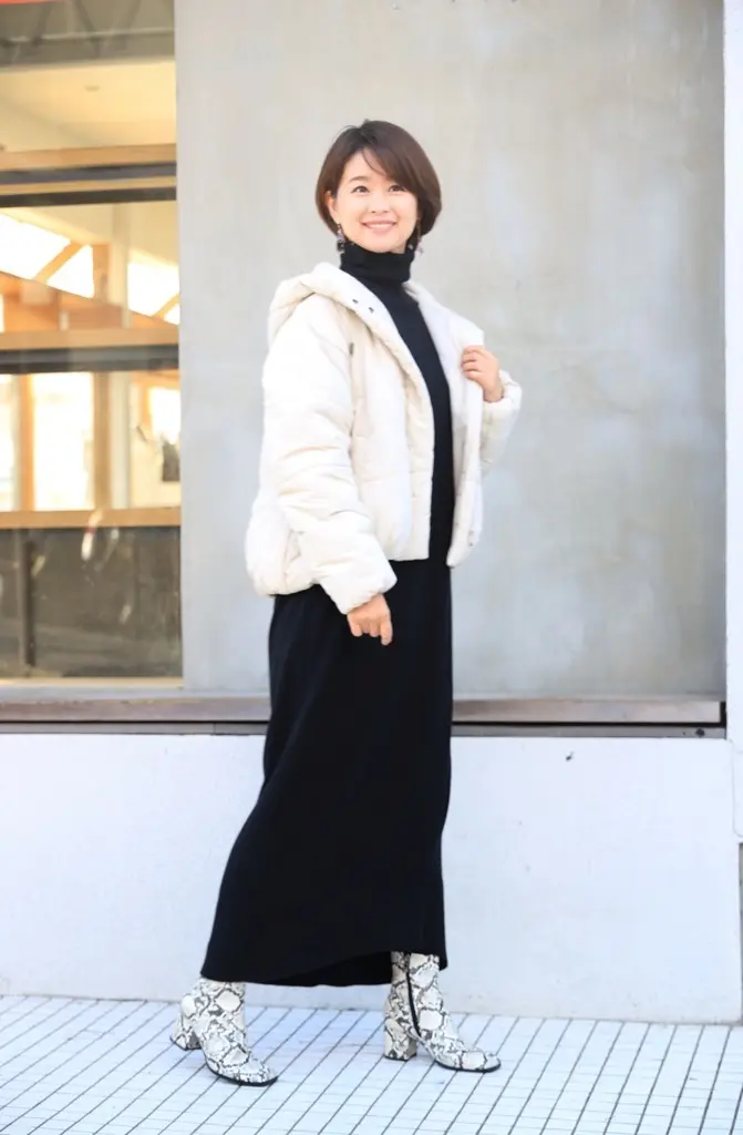 黒タートルのニットワンピースの画像_1