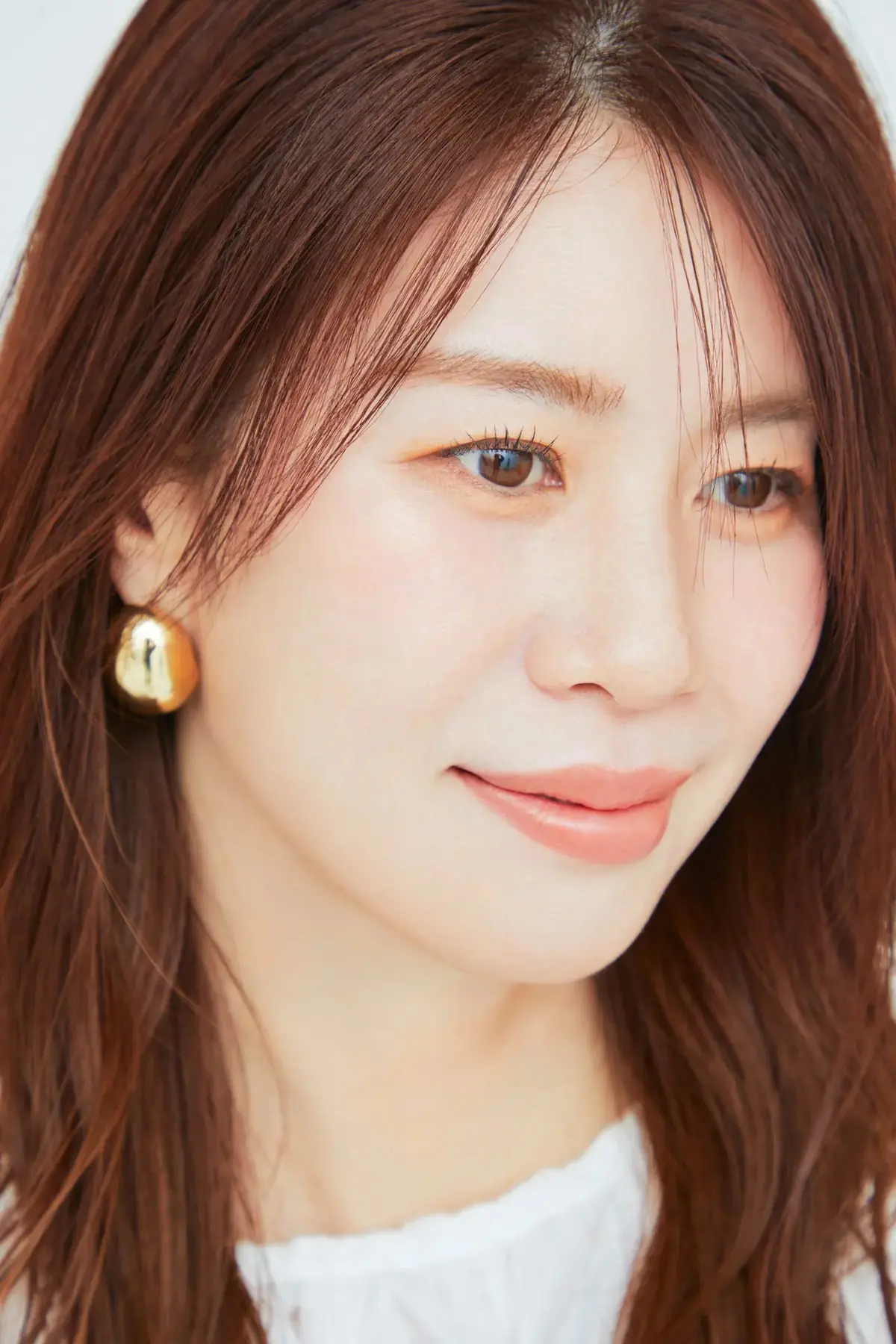 「影の前髪」がポイント！大人のロングをふんわり印象にカムフラージュ