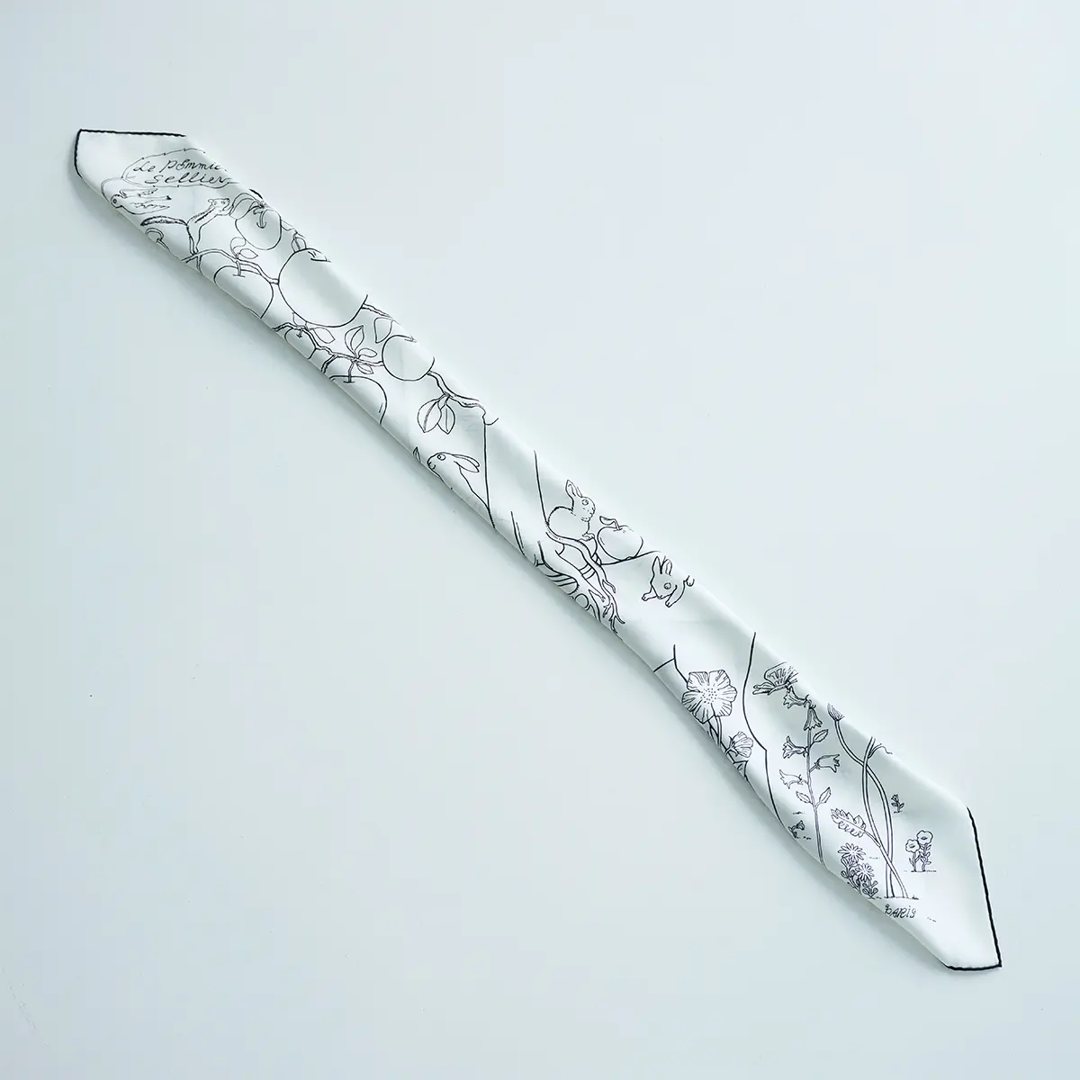 4、5回折って、幅7～8㎝の 細長い形にする