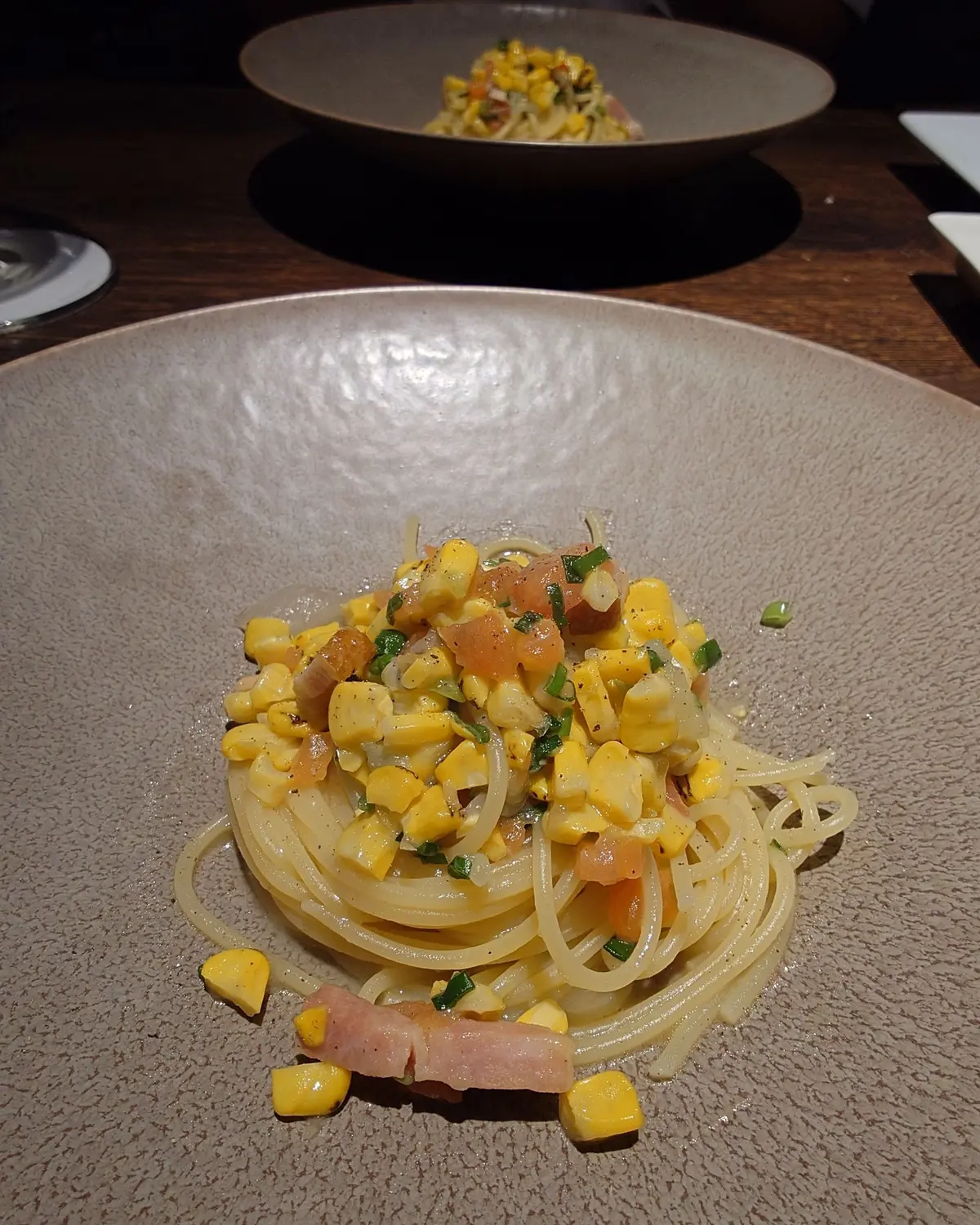 神奈川県産焼きとうもろこしとベーコン、玉葱のソースのスパゲッティー