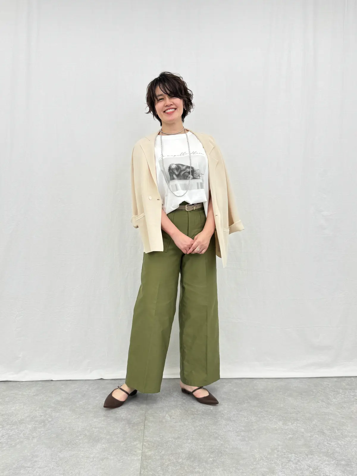 three dots×eclat ニットジャケット ￥27,500を着用した華組　水口宜子さん