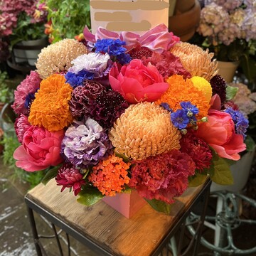 素敵なフラワーアレンジを送ります。