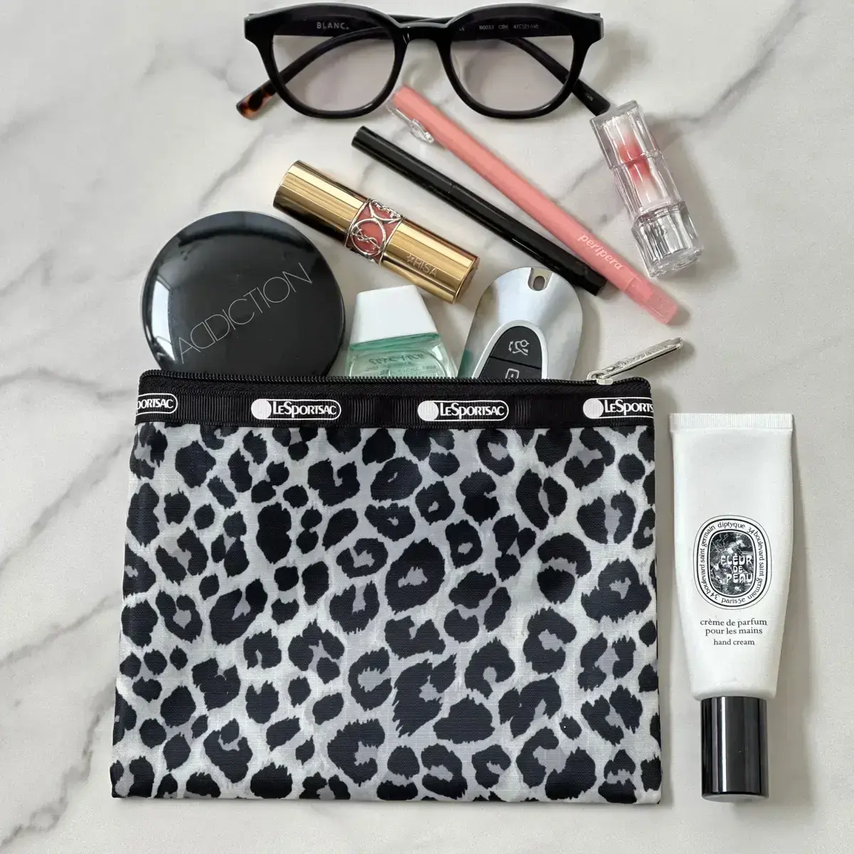 おしゃれな40代・50代から絶賛の声続々！「大人のレオパード柄大小ポーチセット」レスポートサック×エクラ